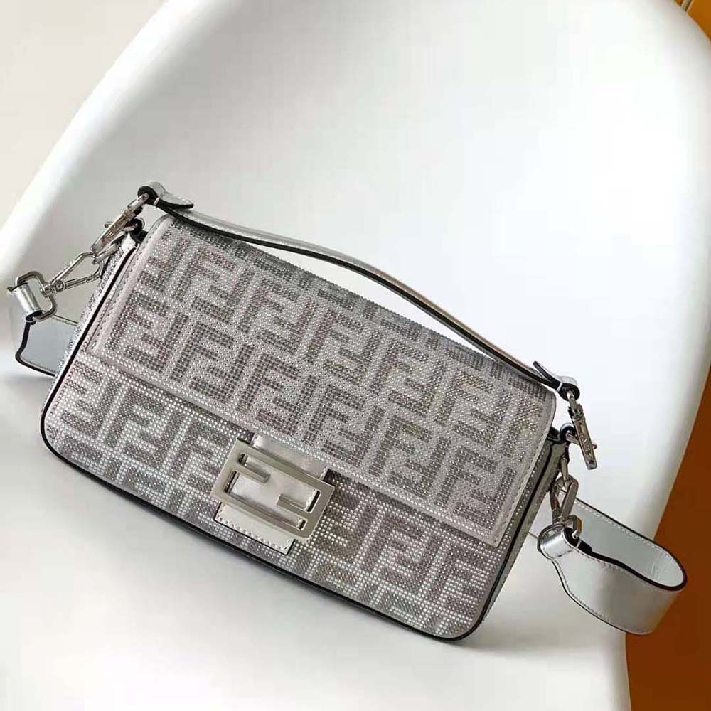 Close-up detail of crystal FF motif on Fendi Women Baguette Silver Leather Bag