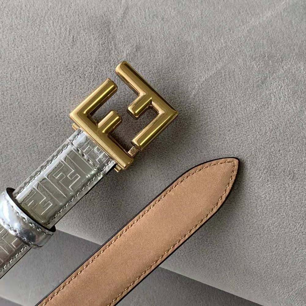 Side angle showing sleek leather and adjustable buckle of Fendi belt