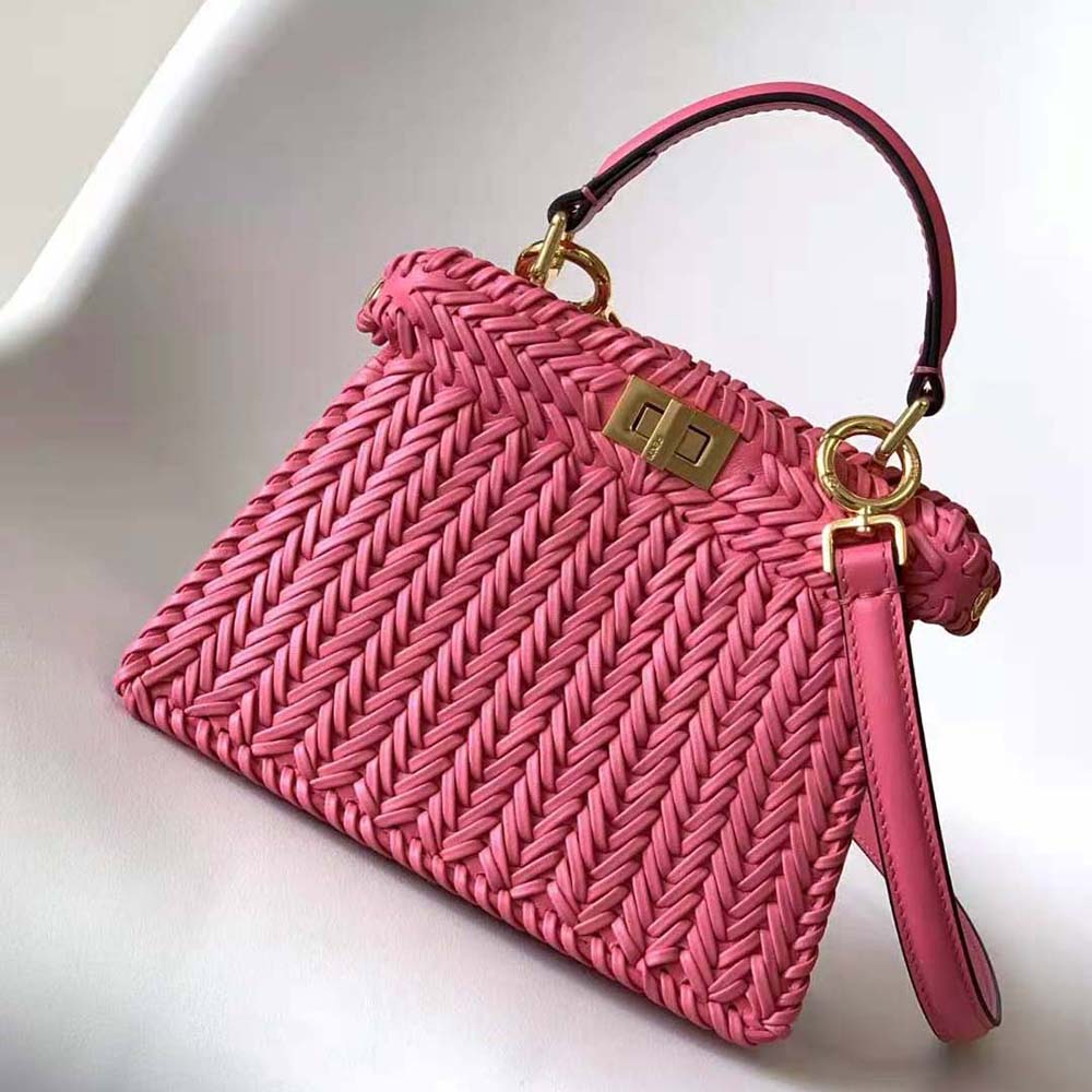Close-up detail of signature eye hardware on Fendi Peekaboo ISeeU bag