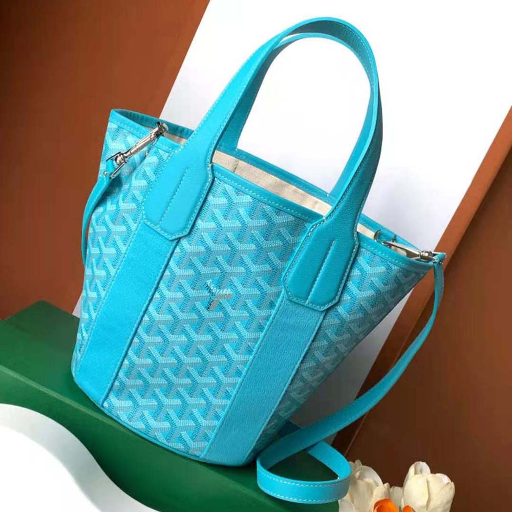Close-up on gold-tone hardware and leather trim of Belharra PM Bag-Blue