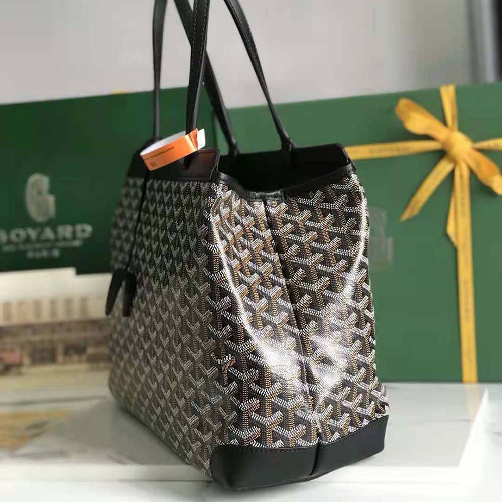 Side angle of Goyard Women Bellechasse Biaude PM Bag-Black highlighting gold hardware