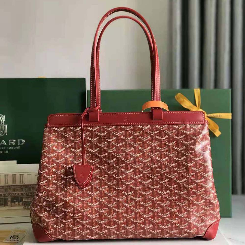Close-up of red Goyardine canvas and Chevron pattern on Bellechasse Biaude PM