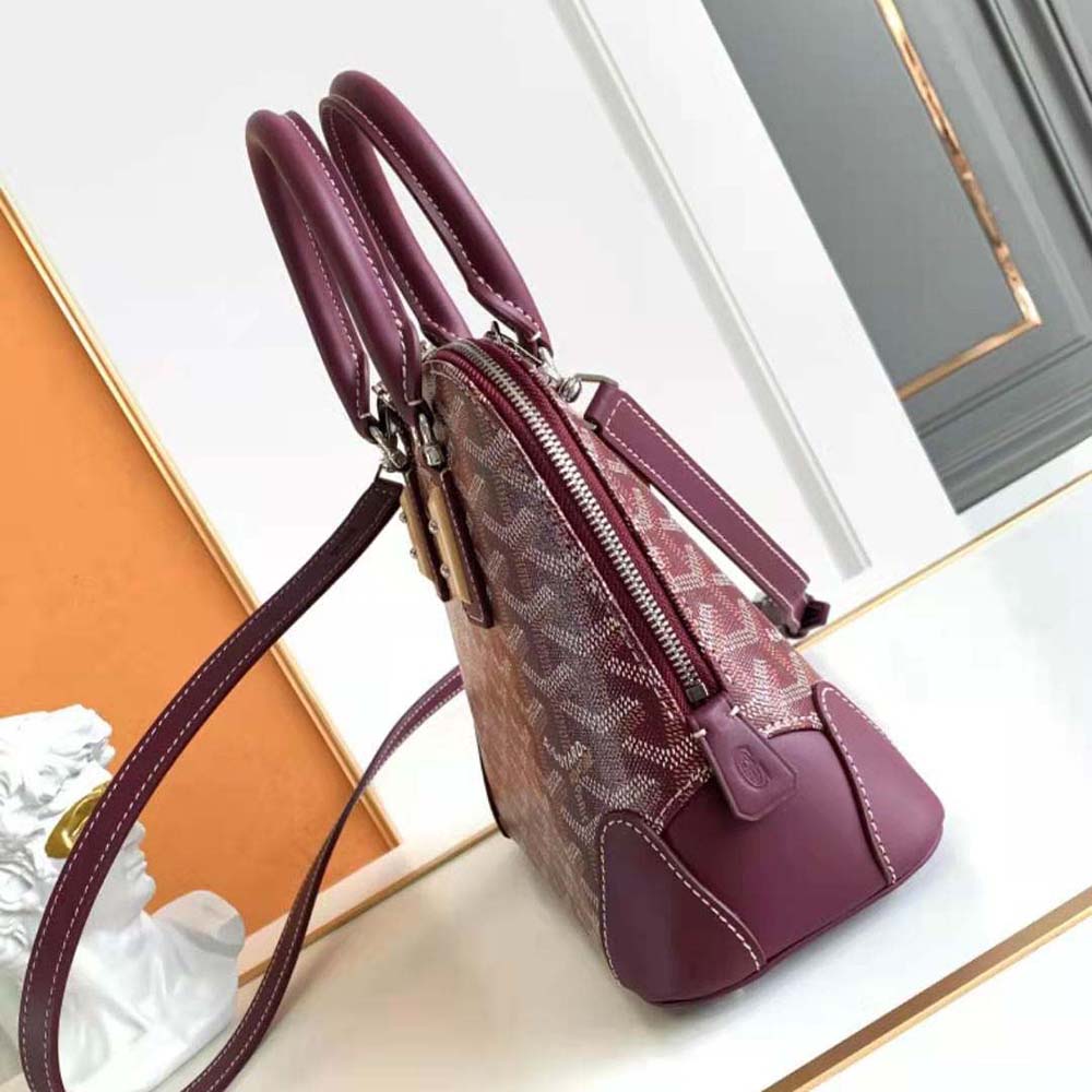 Side angle showcasing leather trim on Goyard Women Vendôme Mini Bag-Maroon