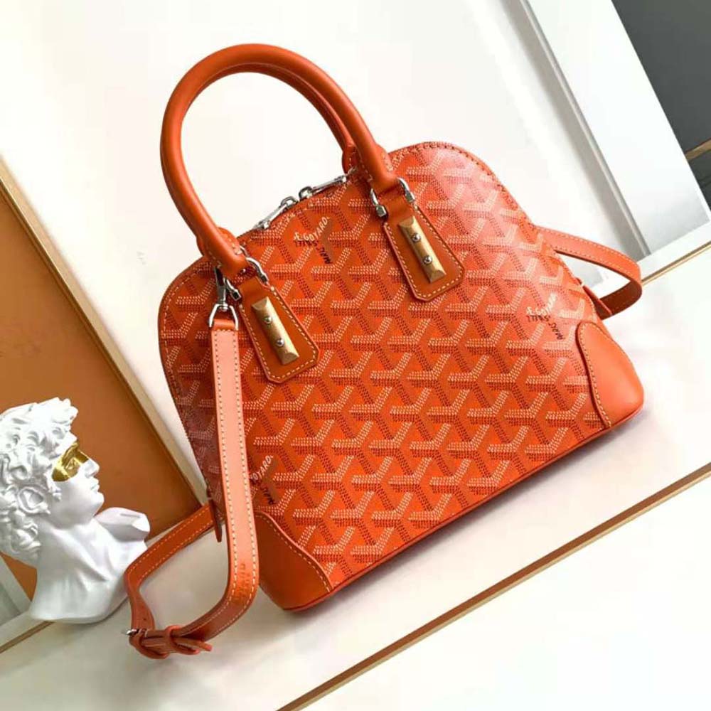 Close-up of Goyard Women Vendôme Mini Bag-Orange brass hardware detail
