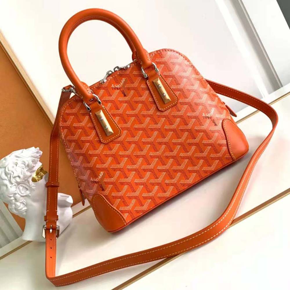 Side angle showing silhouette of Goyard Women Vendôme Mini Bag-Orange