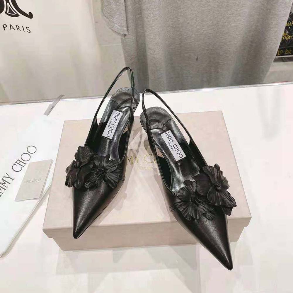 Rear angle showing adjustable buckle on Jimmy Choo Amita Flowers 45 pumps