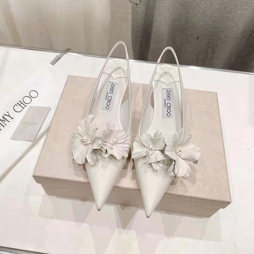 Close-up of white floral detail on Jimmy Choo Amita Flowers 45 sling backs