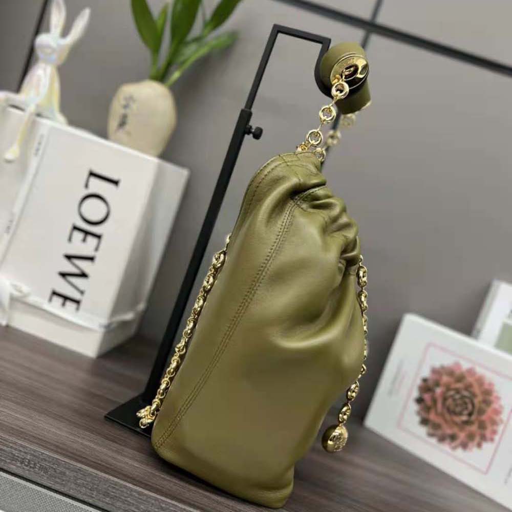 Side angle showing curved silhouette of Loewe Women Small Squeeze Bag
