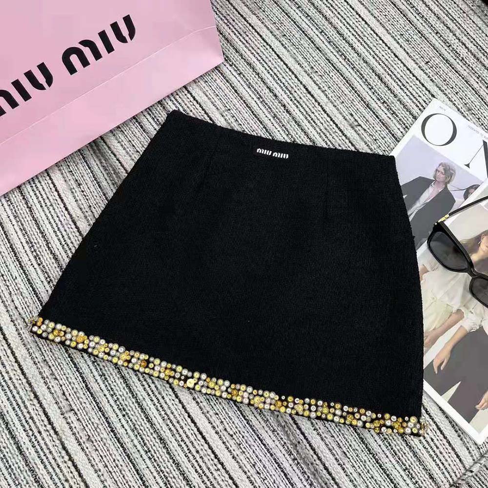 Side angle showing silhouette of Miu Miu Women Embroidered Tweed Miniskirt