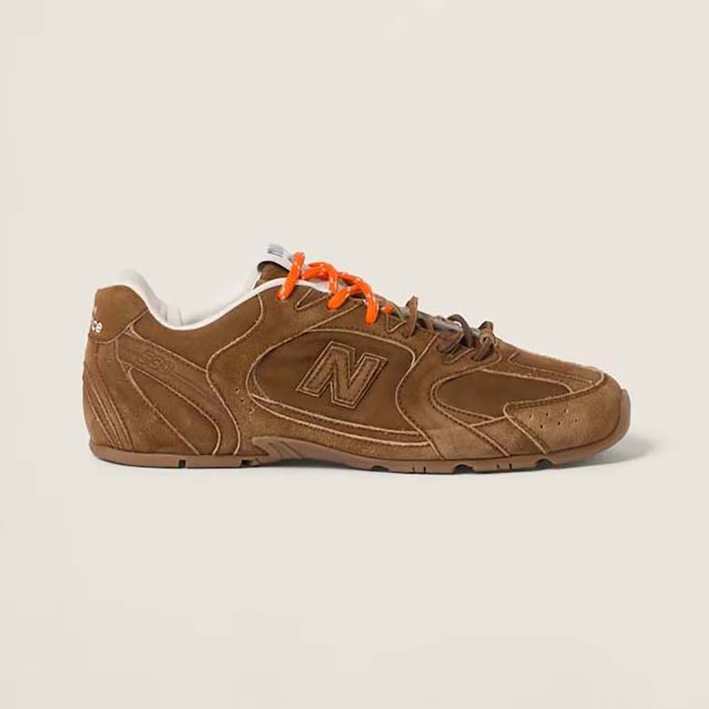 Side view of Miu Miu Women New Balance X Miu Miu 530 SL Suede Sneakers-Brown