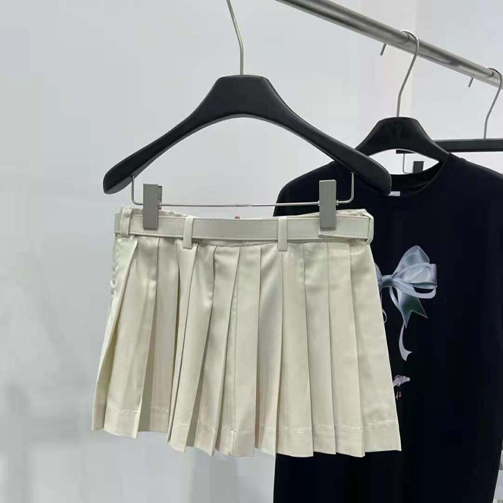 Close-up on delicate pleats of Miu Miu Women Pleated Batavia Miniskirt