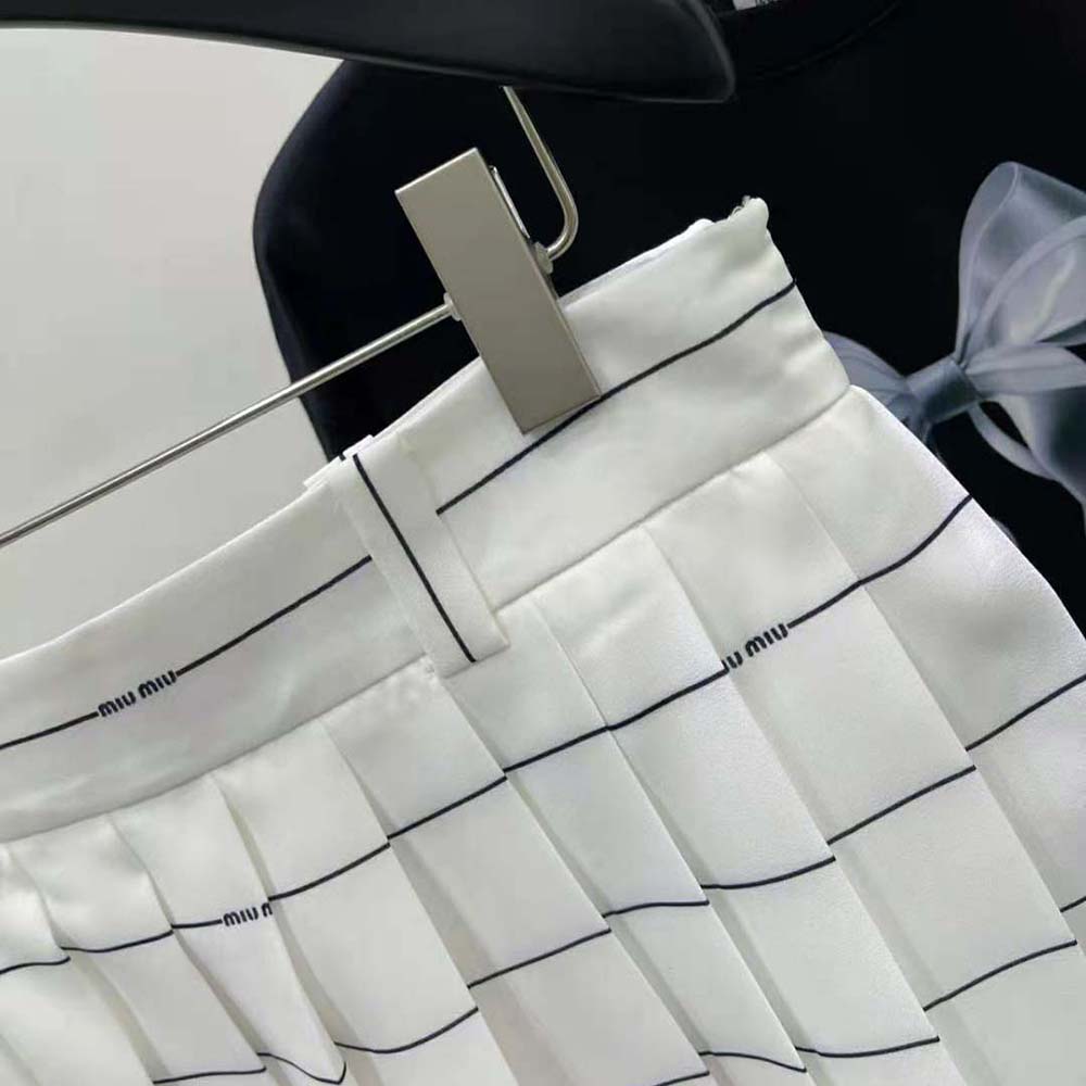Side angle showing silhouette of Miu Miu Women Striped Sablé Miniskirt