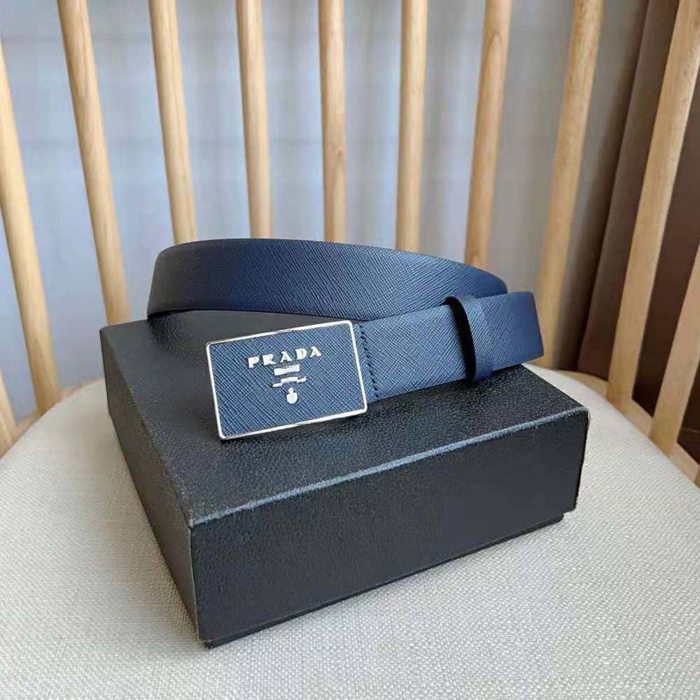Close-up of Prada logo on silver buckle of the belt