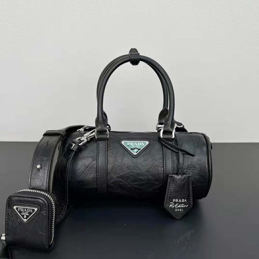 Close-up of silver-tone hardware on Prada Women Antique Nappa Leather Handbag-Black