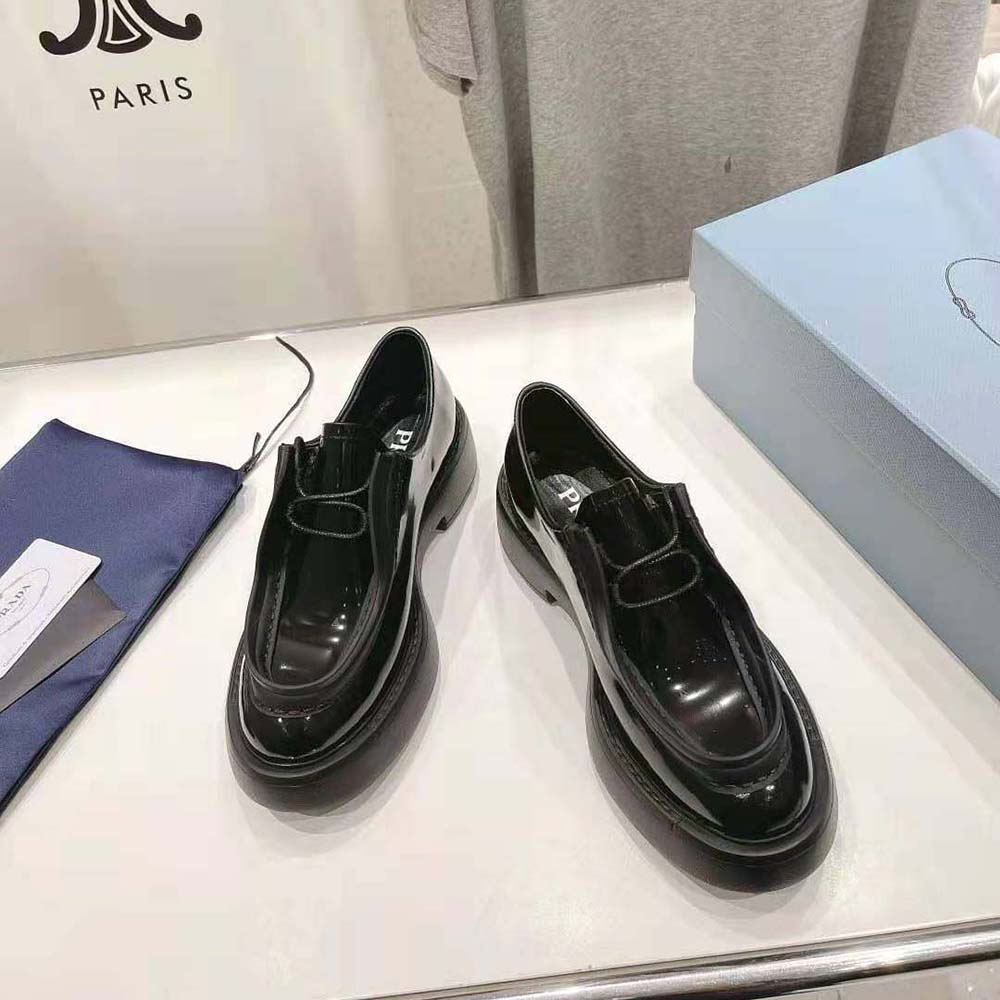 Top view highlighting lace-up closure on Prada Women Brushed Leather Shoes