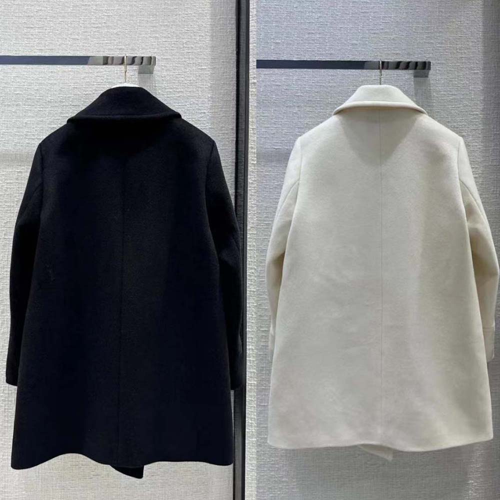 Side angle highlighting tailored silhouette of Prada Women Double-breasted Cloth Peacoat-Black