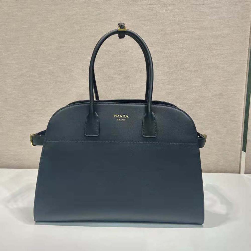 Close-up of silver buckles on Prada Women Large Leather Tote Bag with Buckles-Black