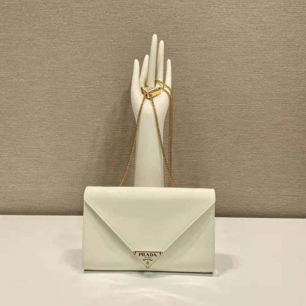 Side angle of Prada Women Patent Leather Mini-bag-White with strap