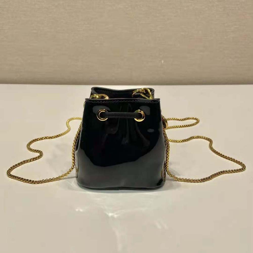 Side angle highlighting slim silhouette of Prada Women Patent Leather Mini-pouch-Black