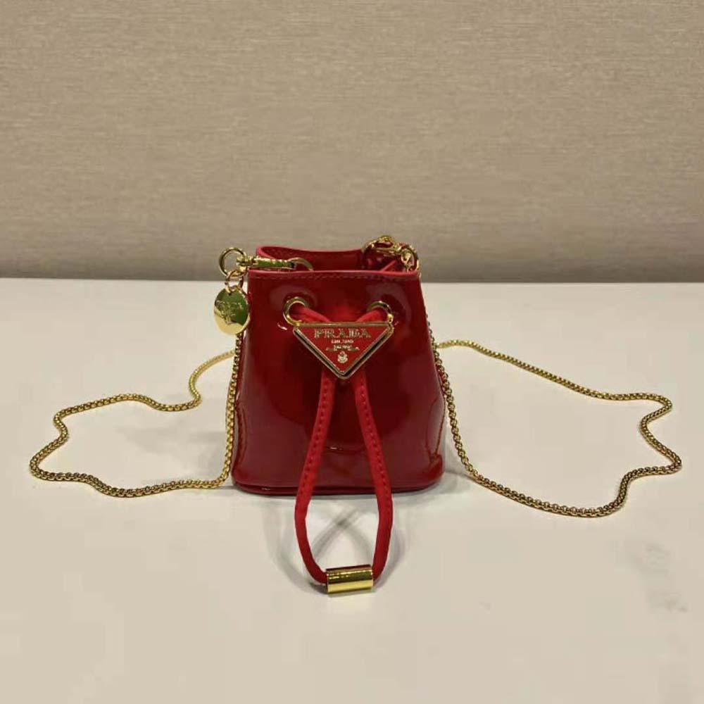 Close-up detail of silver hardware on Prada Women Patent Leather Mini-pouch-Red