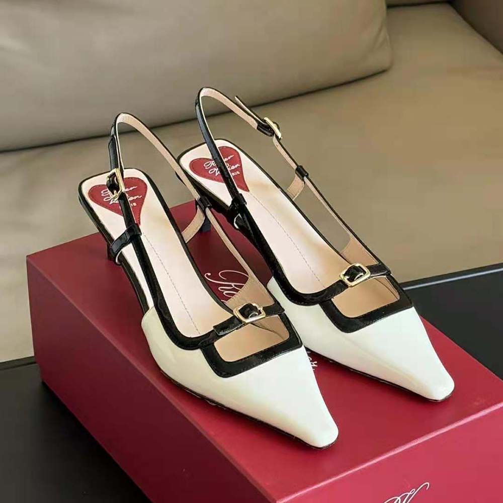 Close-up of signature buckle on Roger Vivier Viv’ Canard Slingback Pumps