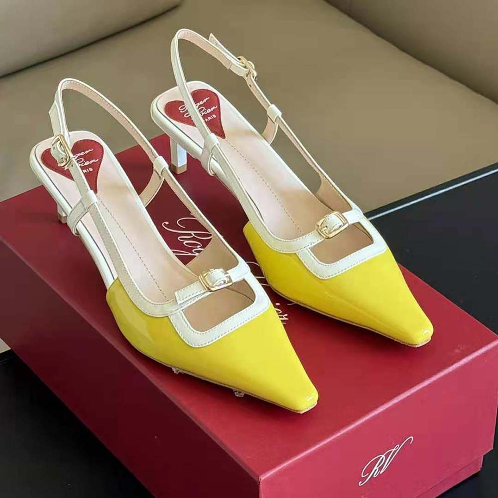 Rear view showing adjustable slingback strap of Roger Vivier yellow patent pumps