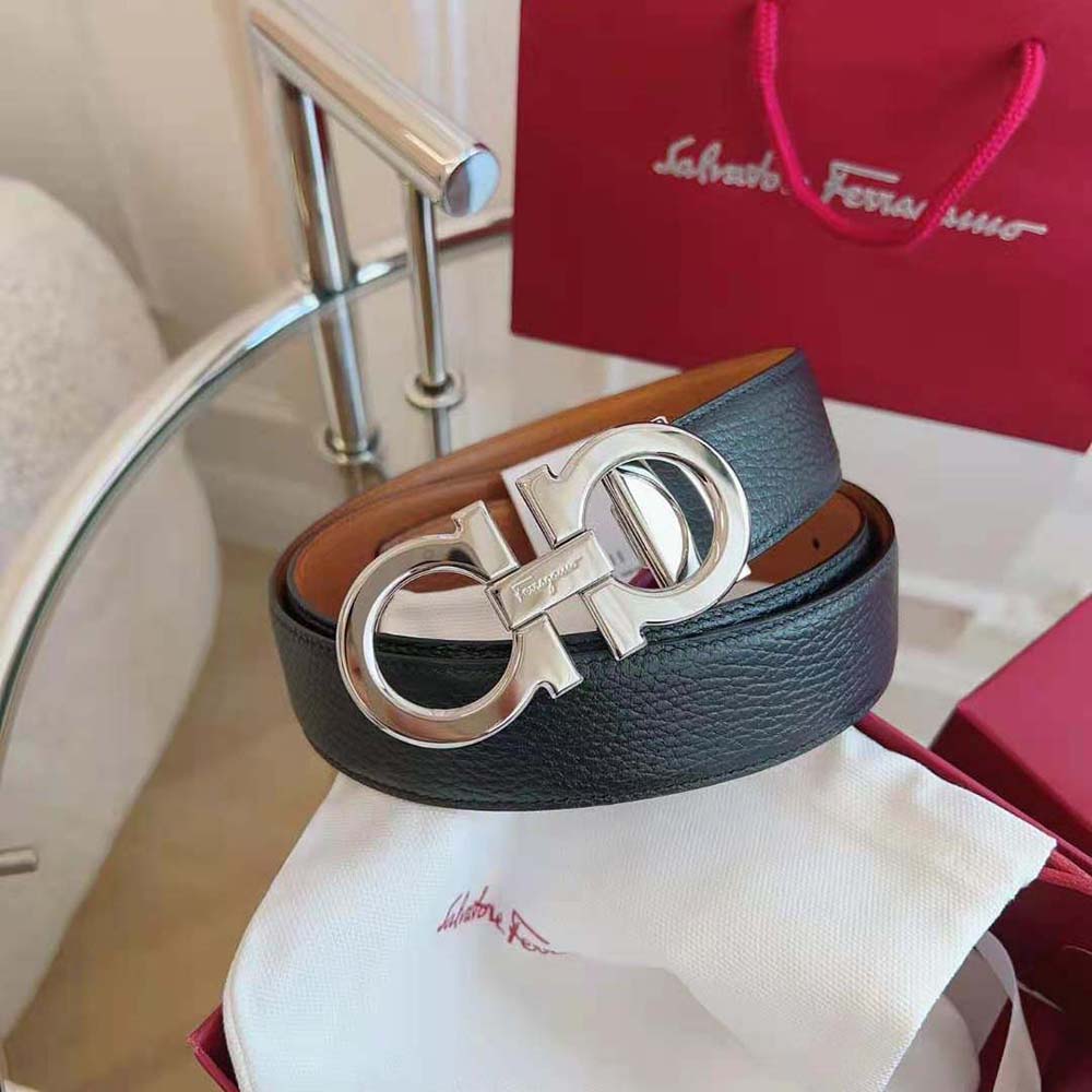 Side angle displaying leather texture on Salvatore Ferragamo Men Reversible and Adjustable Gancini Belt-Brown