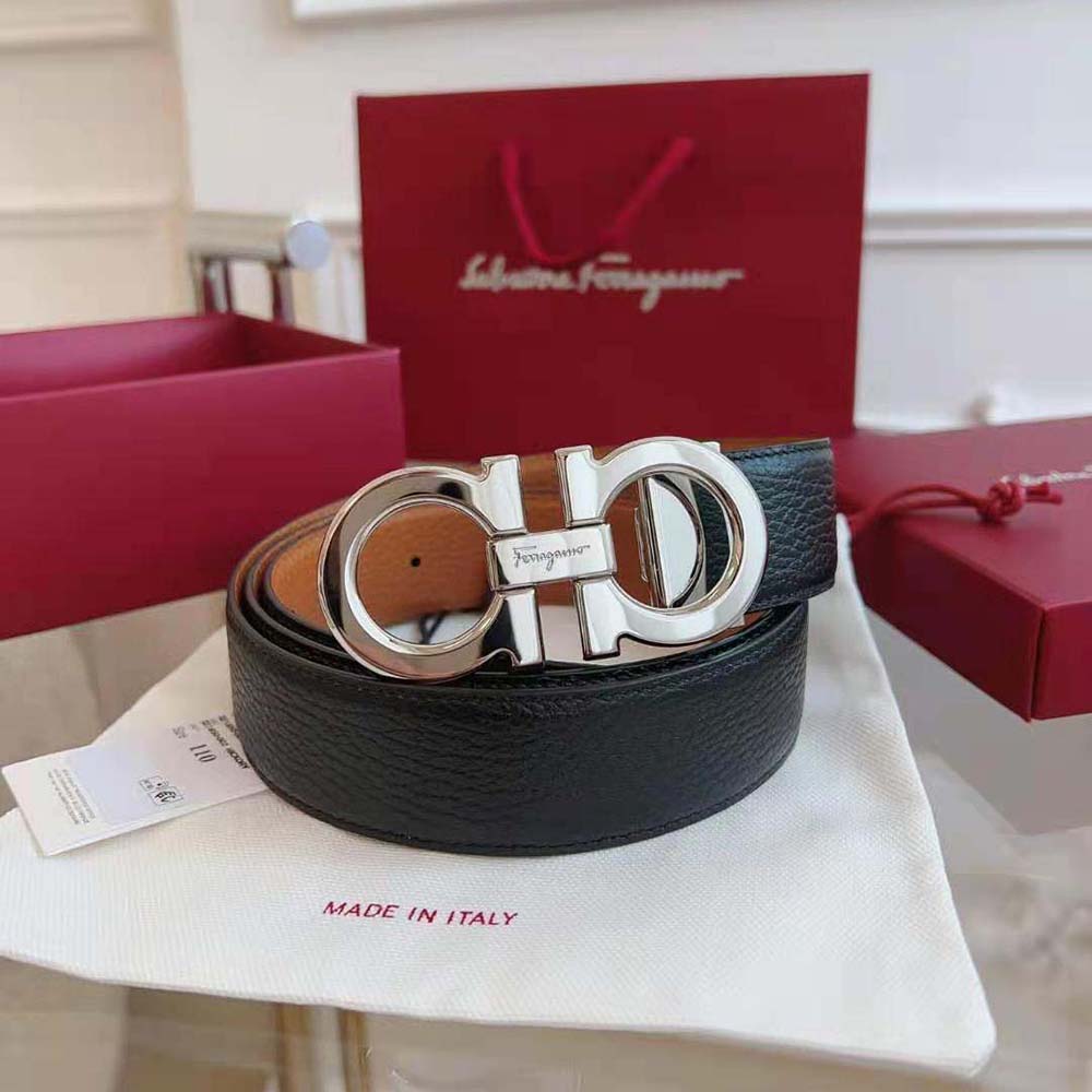 Close-up detail of polished Gancini buckle on Salvatore Ferragamo Men Reversible and Adjustable Gancini Belt-Brown