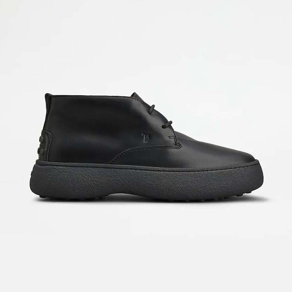 Side view of Tod’s Men W. G. Desert Boots in Leather-Black