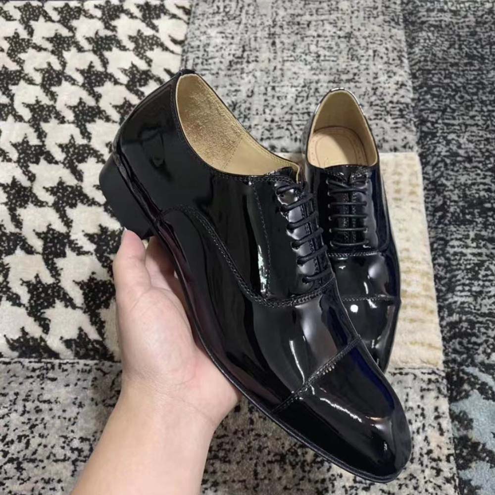 Top-down angle showing lacing and glossy finish on Greggo Lace-up Shoes black