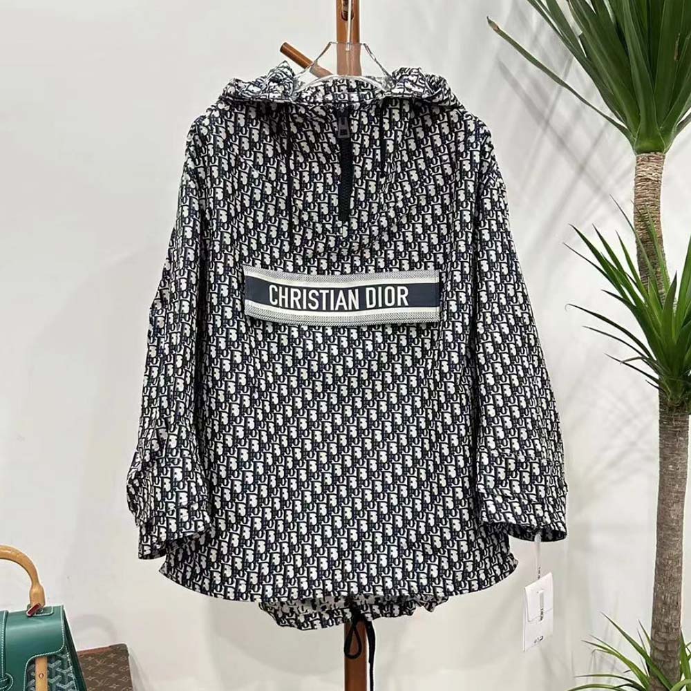 Close-up of Dior Oblique motif jacquard pattern on anorak fabric