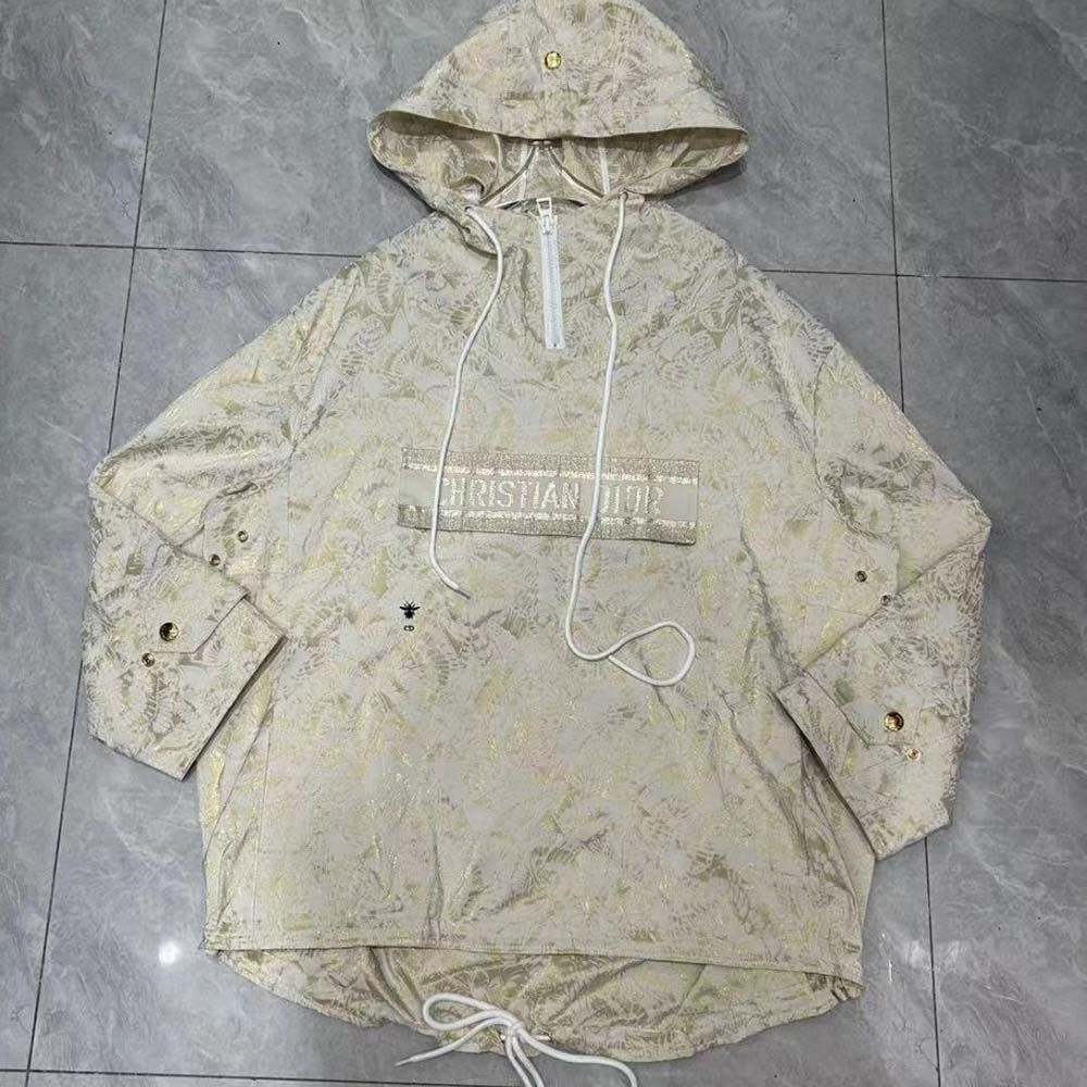 Side profile showing hood and relaxed fit of Dior Women Hooded D-Way windbreaker