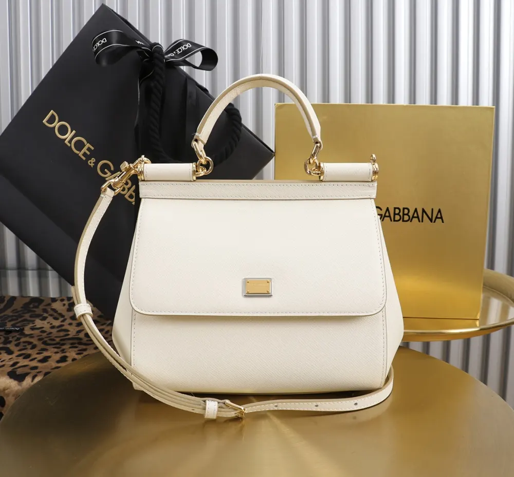 Side angle showing white leather quilting on Dolce Gabbana D&G Sicily Bag