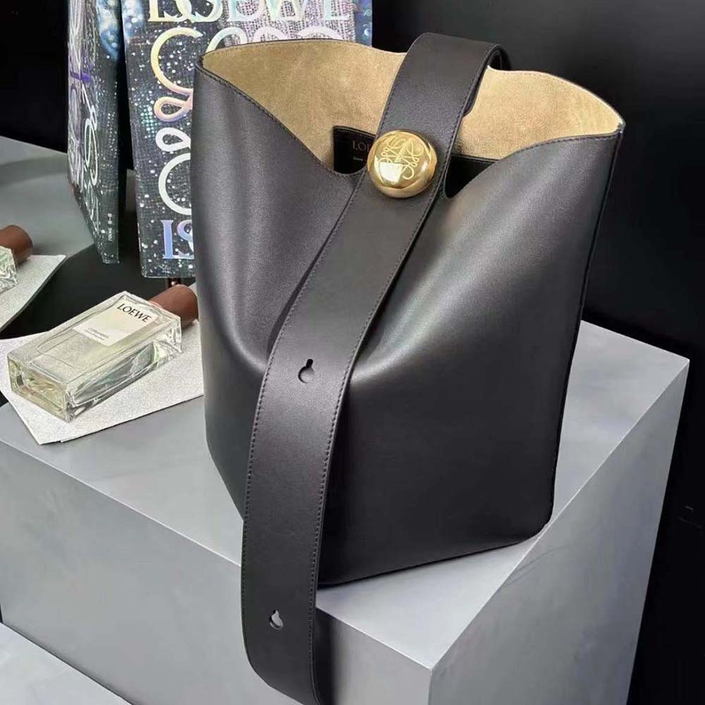 Side angle showing pebble texture on Loewe Unisex Medium Pebble Bucket Bag
