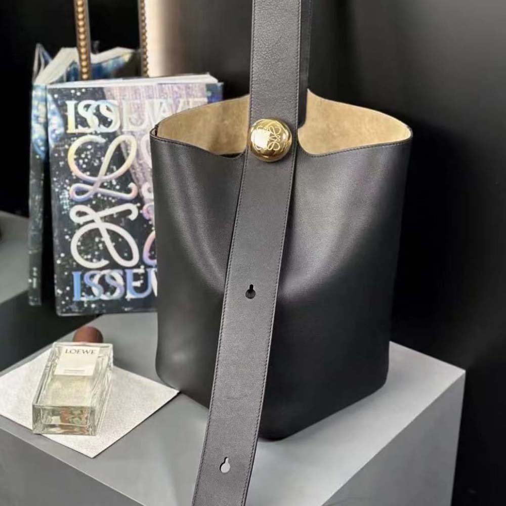 Close-up of drawstring closure and silver-tone hardware on Loewe bucket bag
