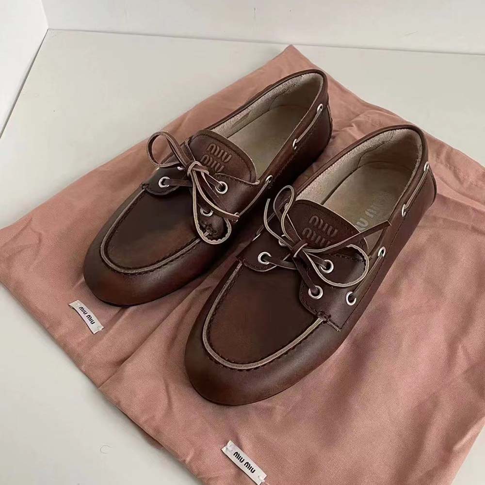 Top view showing unlined interior of Miu Miu Women Brown Loafers