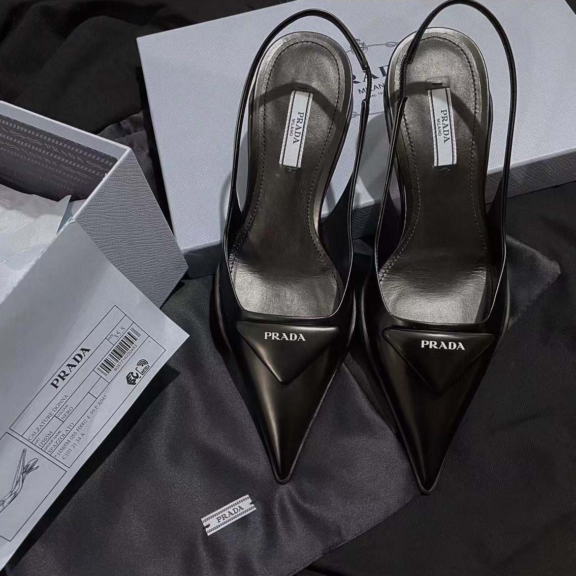 Close-up of brushed leather texture on Prada slingback pumps