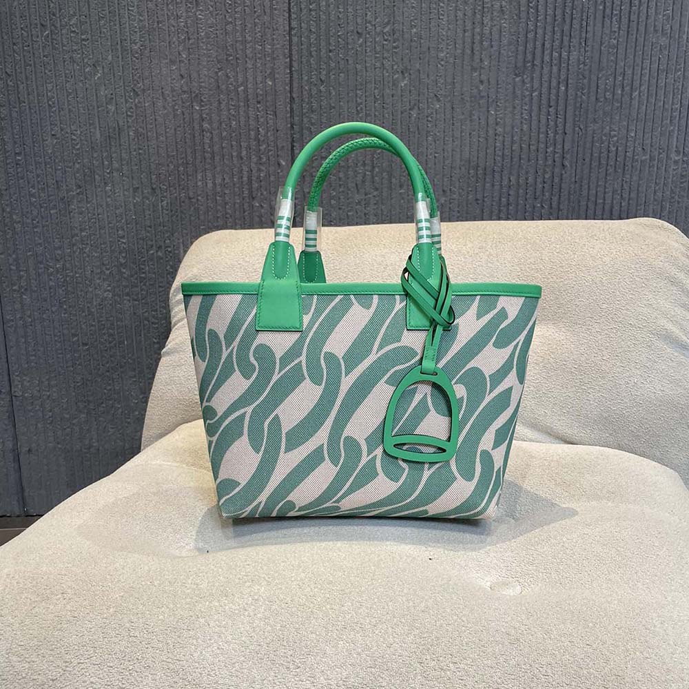 Close-up of signature silver hardware on Hermes Steeple 25 tote
