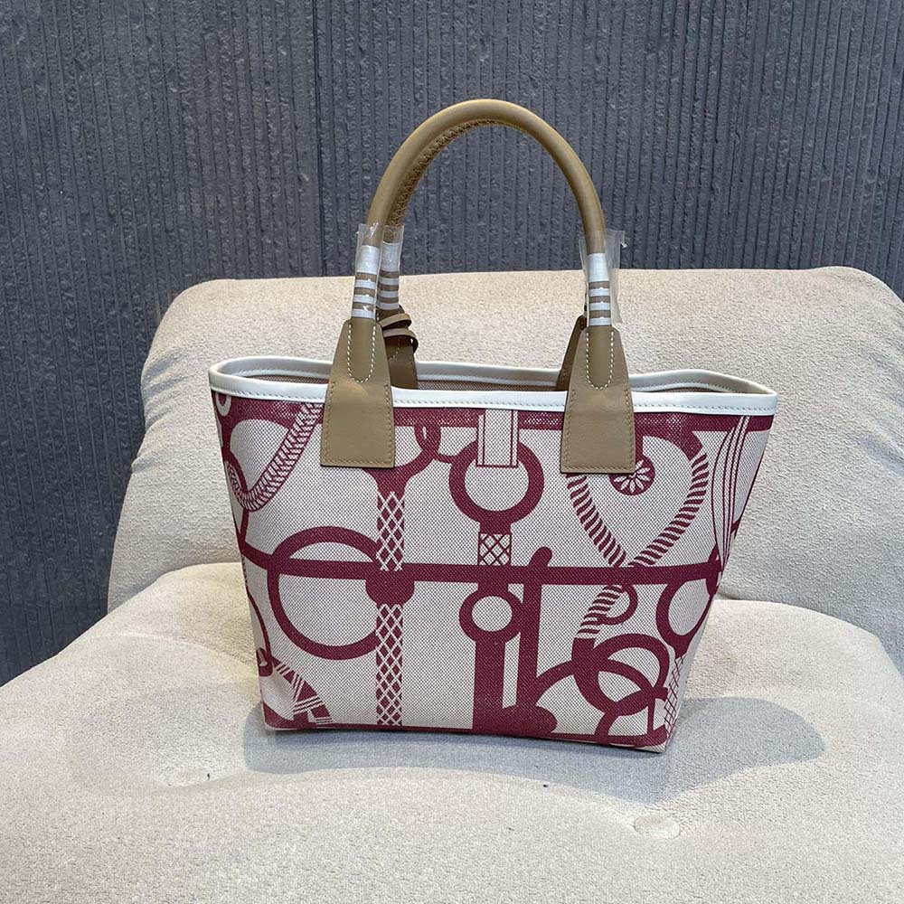 Side angle showing structured silhouette of Hermes Steeple 25 Tote