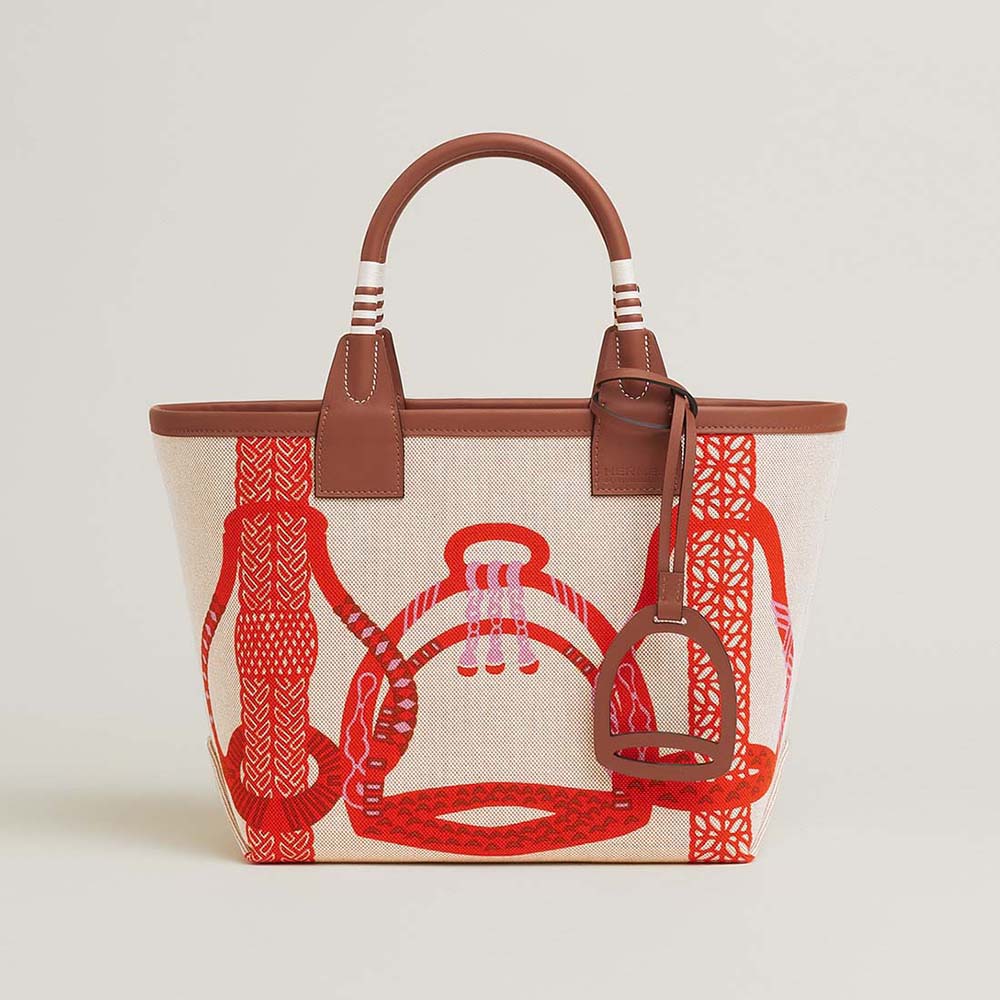 Front angle of Hermes Unisex Steeple 25 Tote Bag-Orange highlighting orange leather