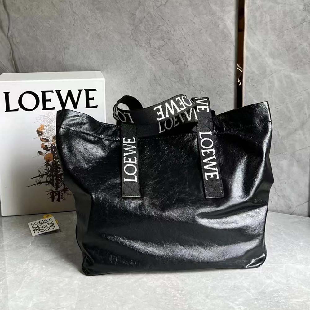 Close-up of silver hardware and leather texture on Loewe Fold Shopper
