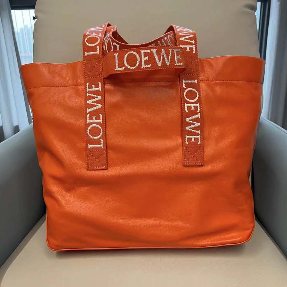 Close-up of Loewe Unisex Fold Shopper foldover closure and hardware