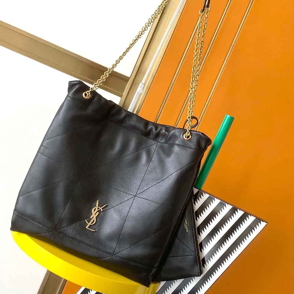 Close-up of gold YSL logo hardware on Jamie 4.3 Pochon shoulder bag