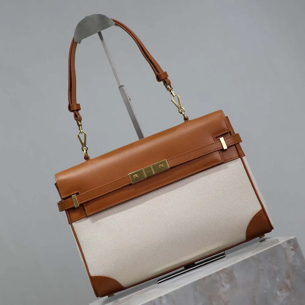 Side profile showing beige canvas and leather details on bag
