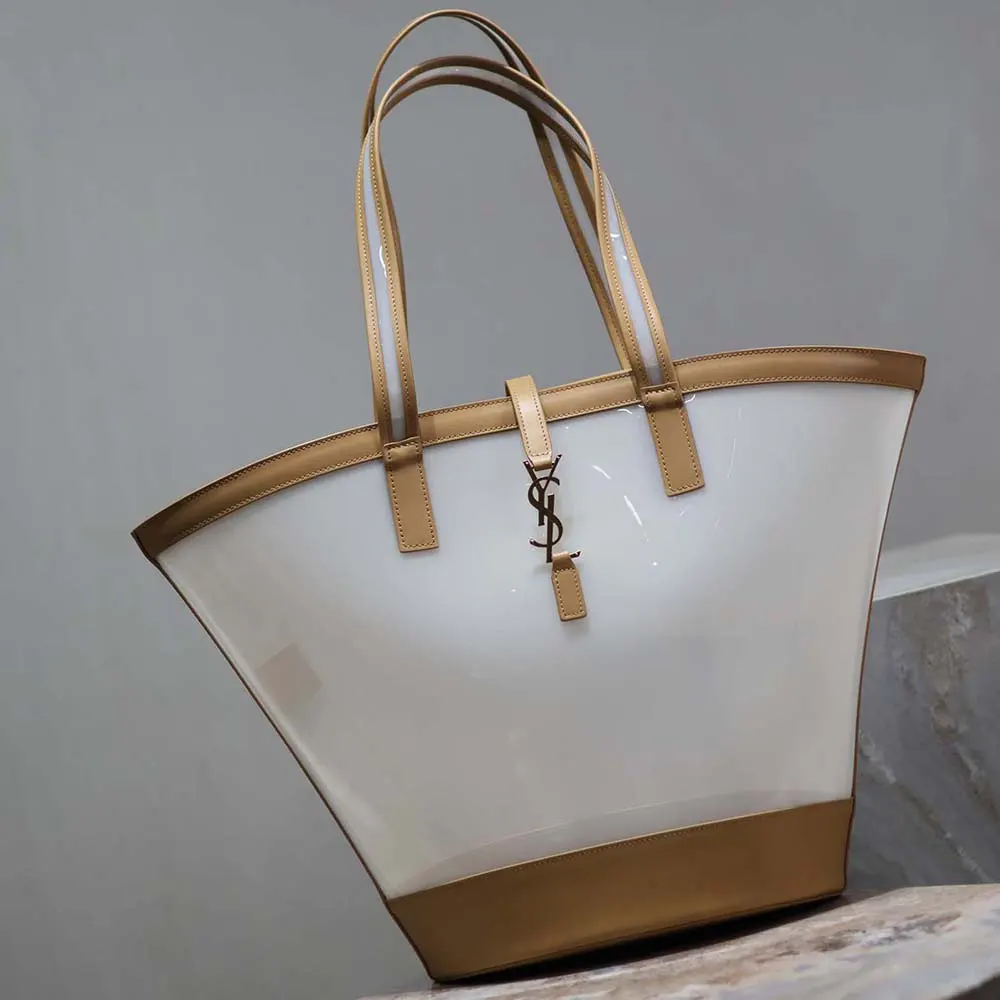 Side angle showing adjustable strap and zip closure on Panier Medium bag