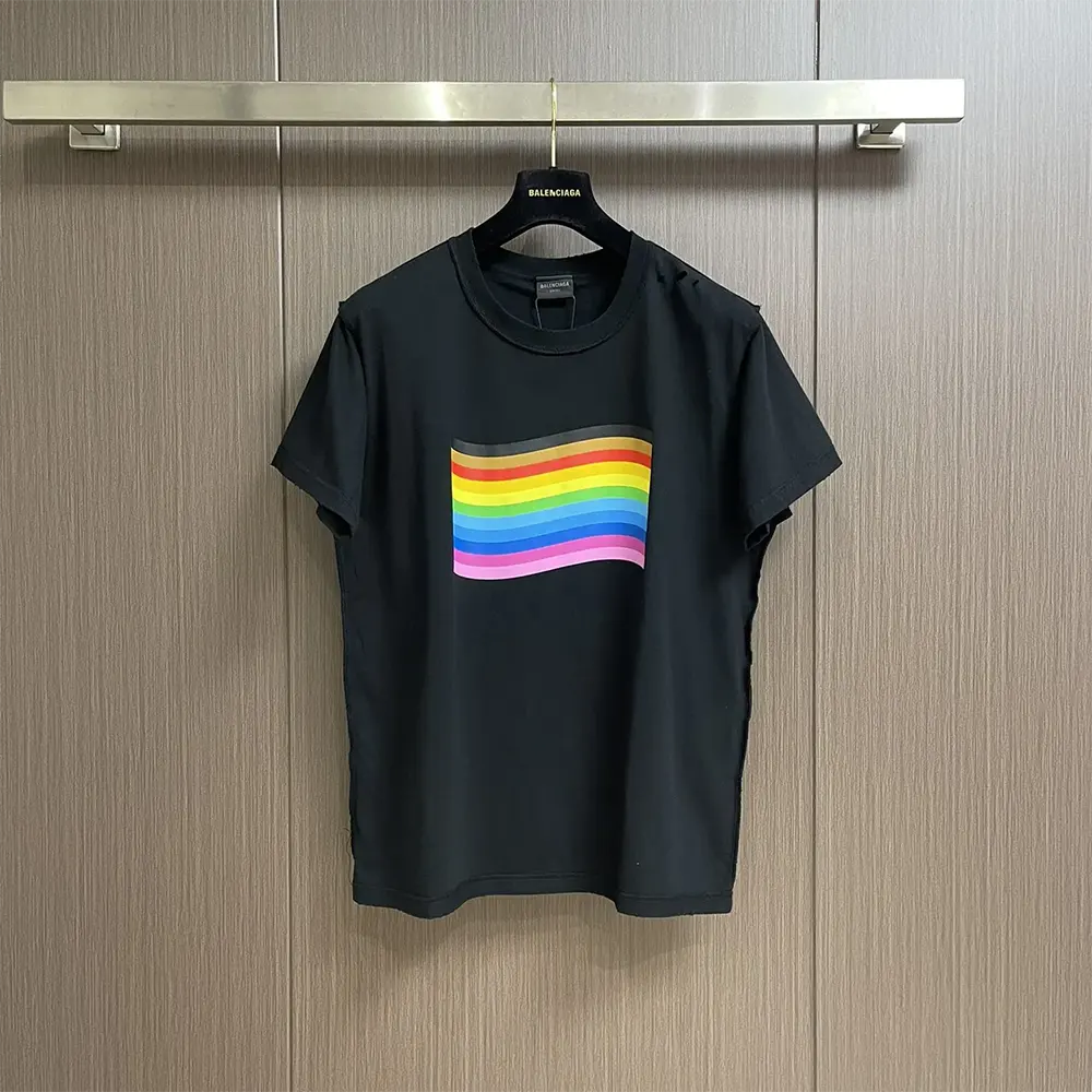 Close-up of inside-out rainbow flag detail on Balenciaga oversized T-shirt