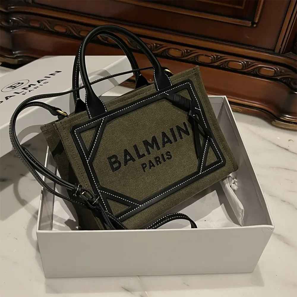 Top zipper detail of Balmain Women B-Army Small Canvas Shopping Bag in grey