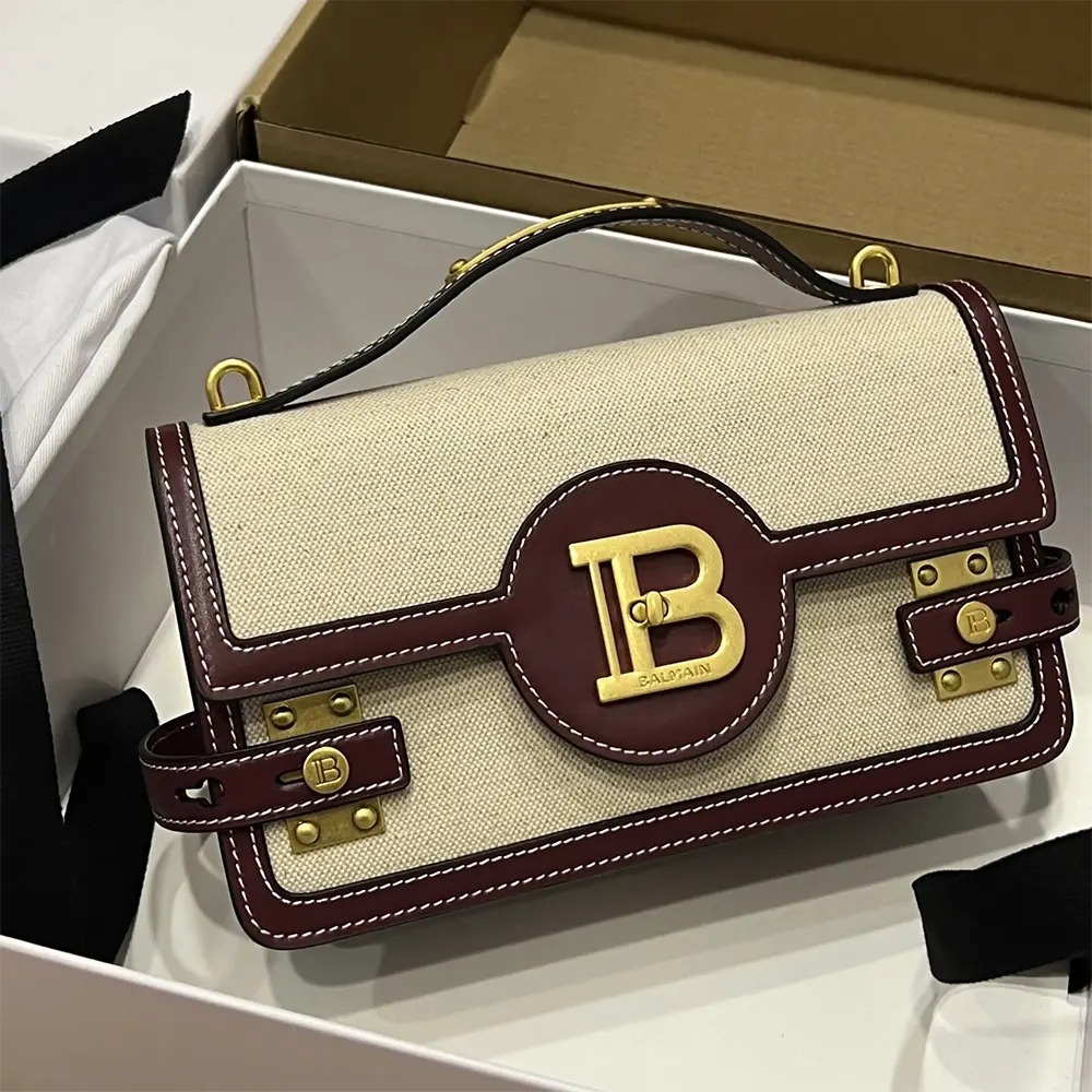 Close-up of gold hardware on Balmain Women B Buzz 24 Canvas and Leather Bag