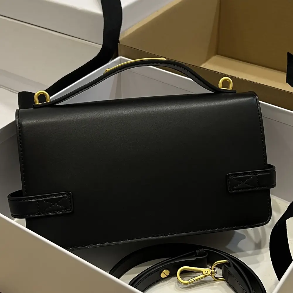 Side angle showing silhouette and smooth leather texture of Balmain Women Smooth Leather B-Buzz 24 Bag-Black