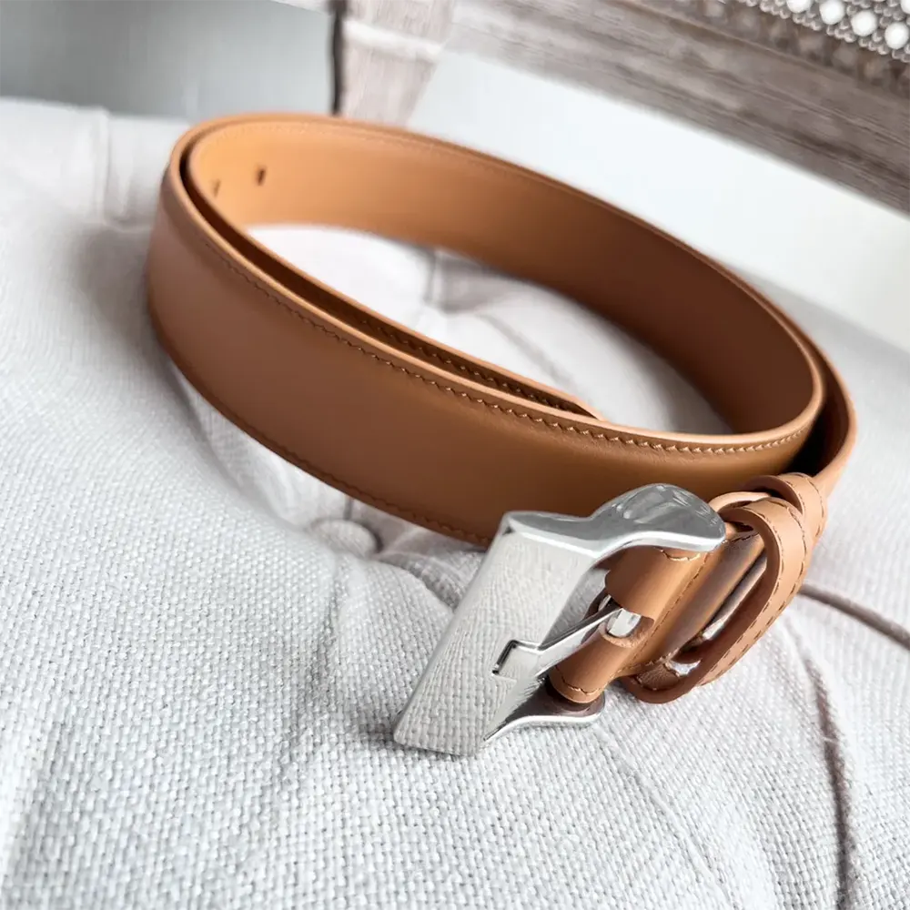 Side angle showing smooth brown calfskin texture of Bottega Veneta belt